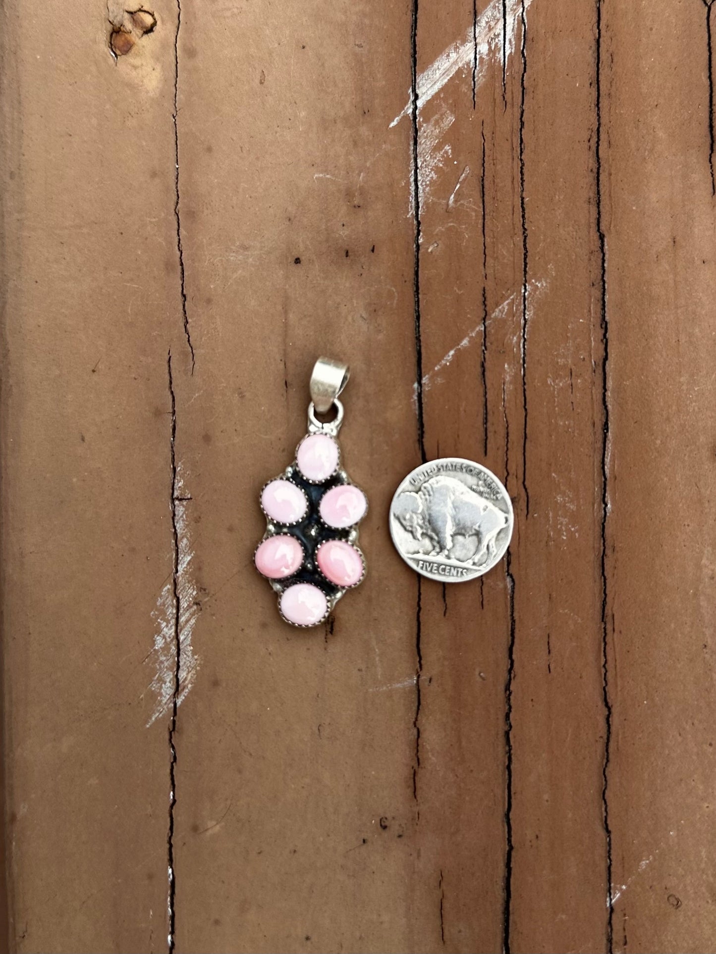 Pink conch pendant