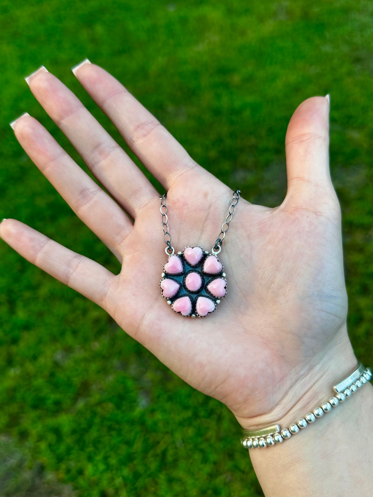 Pink conch heart necklace