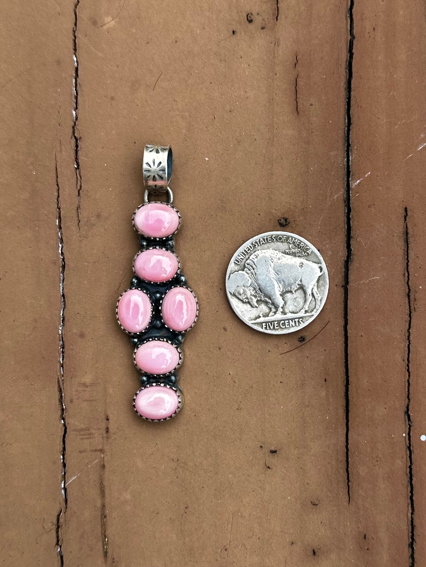 Pink conch pendant