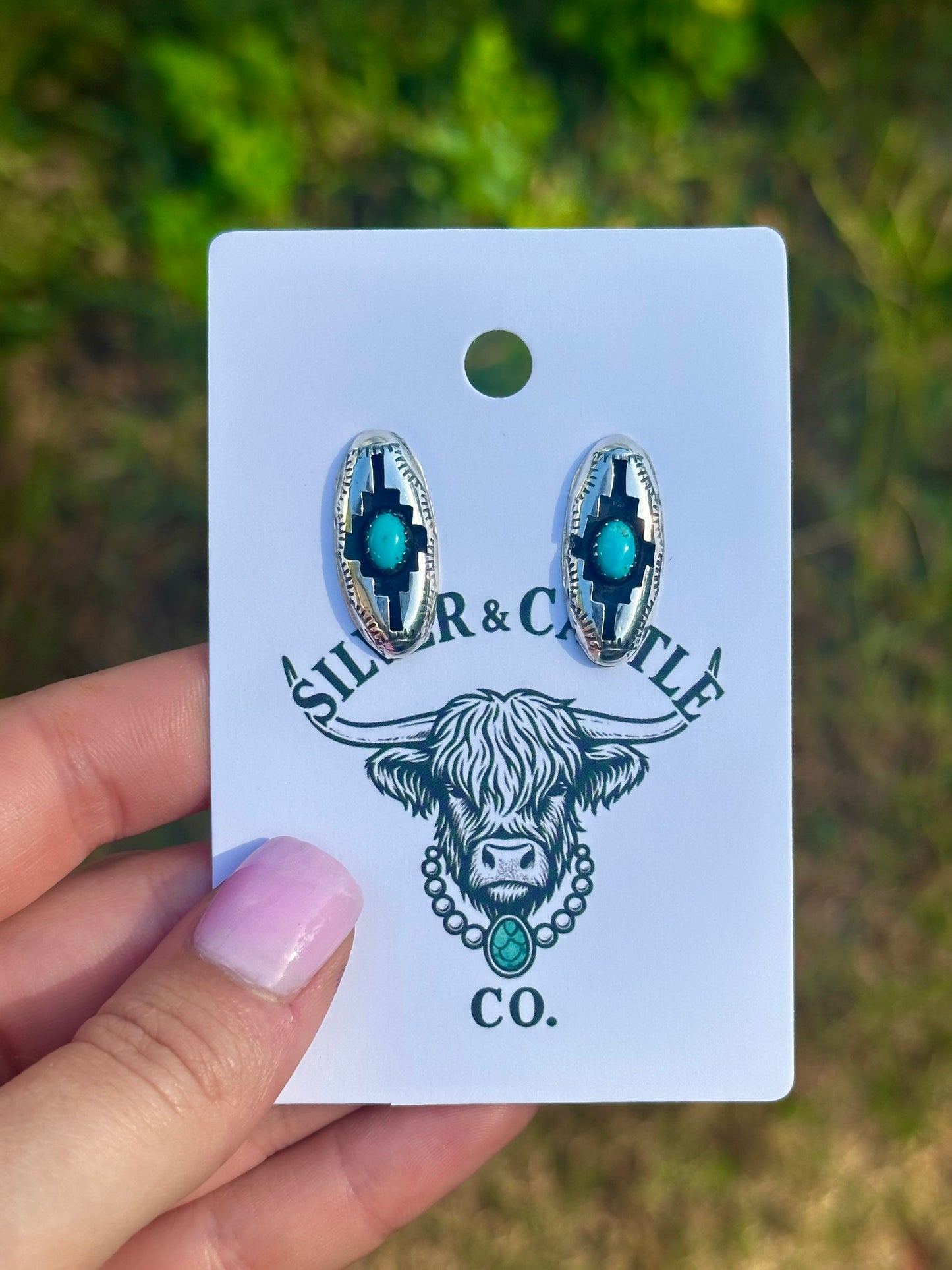 Kingman shadow box earrings by Navajo artist Felix Perry