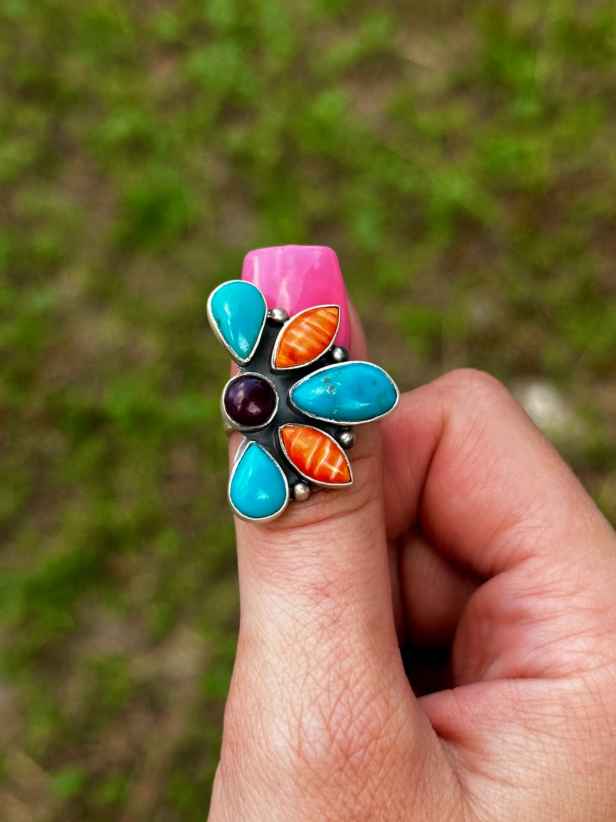Adjustable multi stone half cluster ring