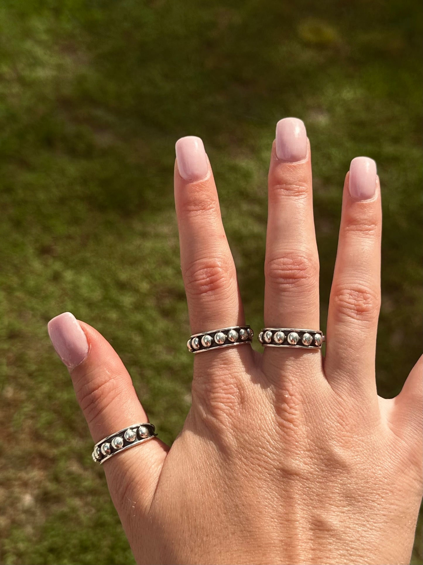 Adjustable beaded ring