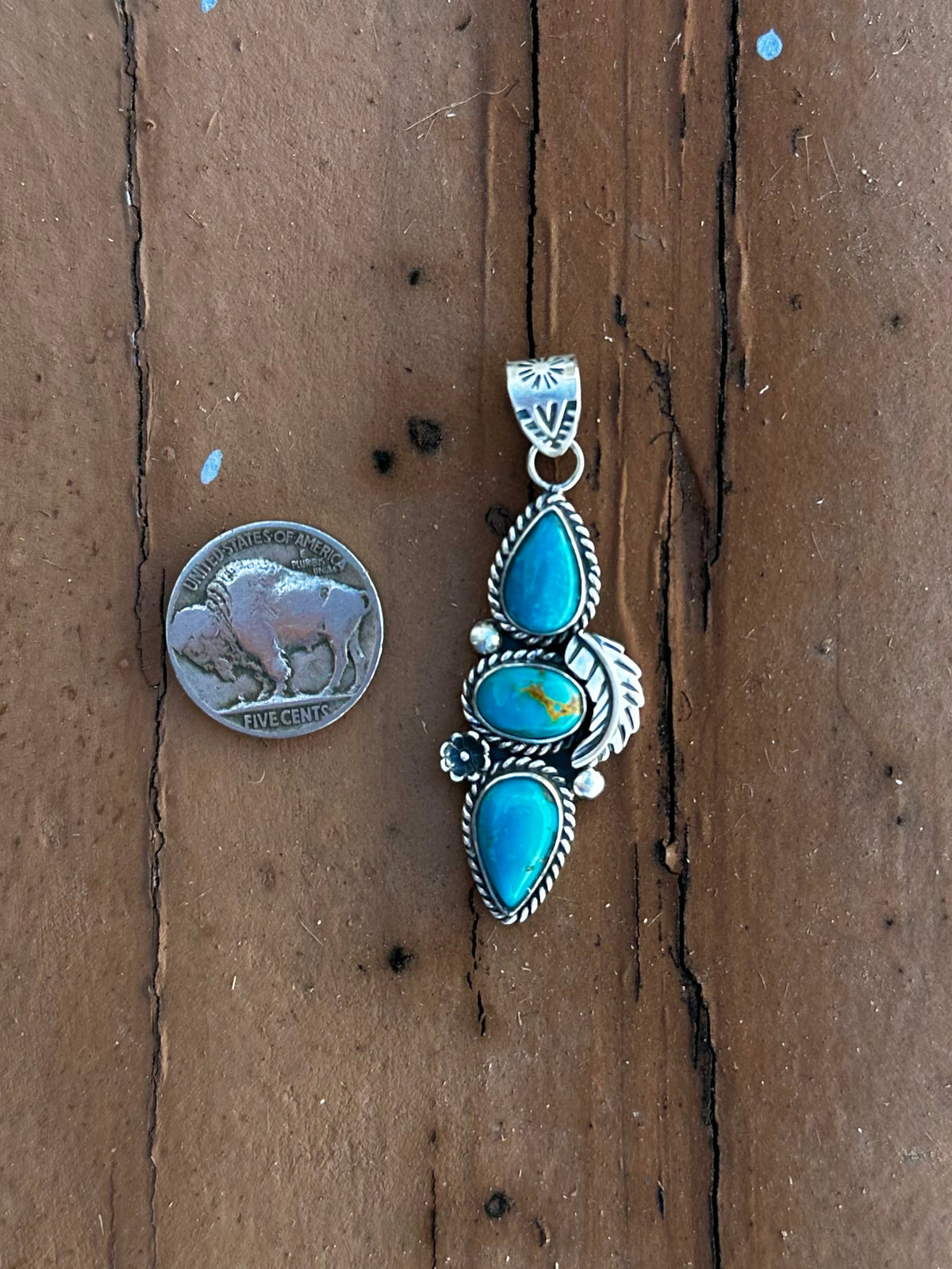 Turquoise feather pendant
