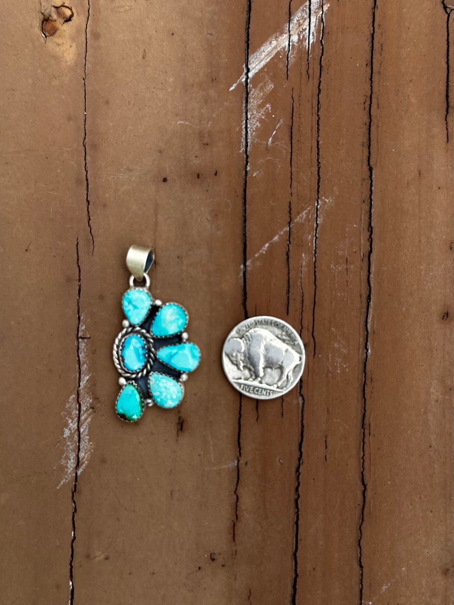 Half cluster pendant