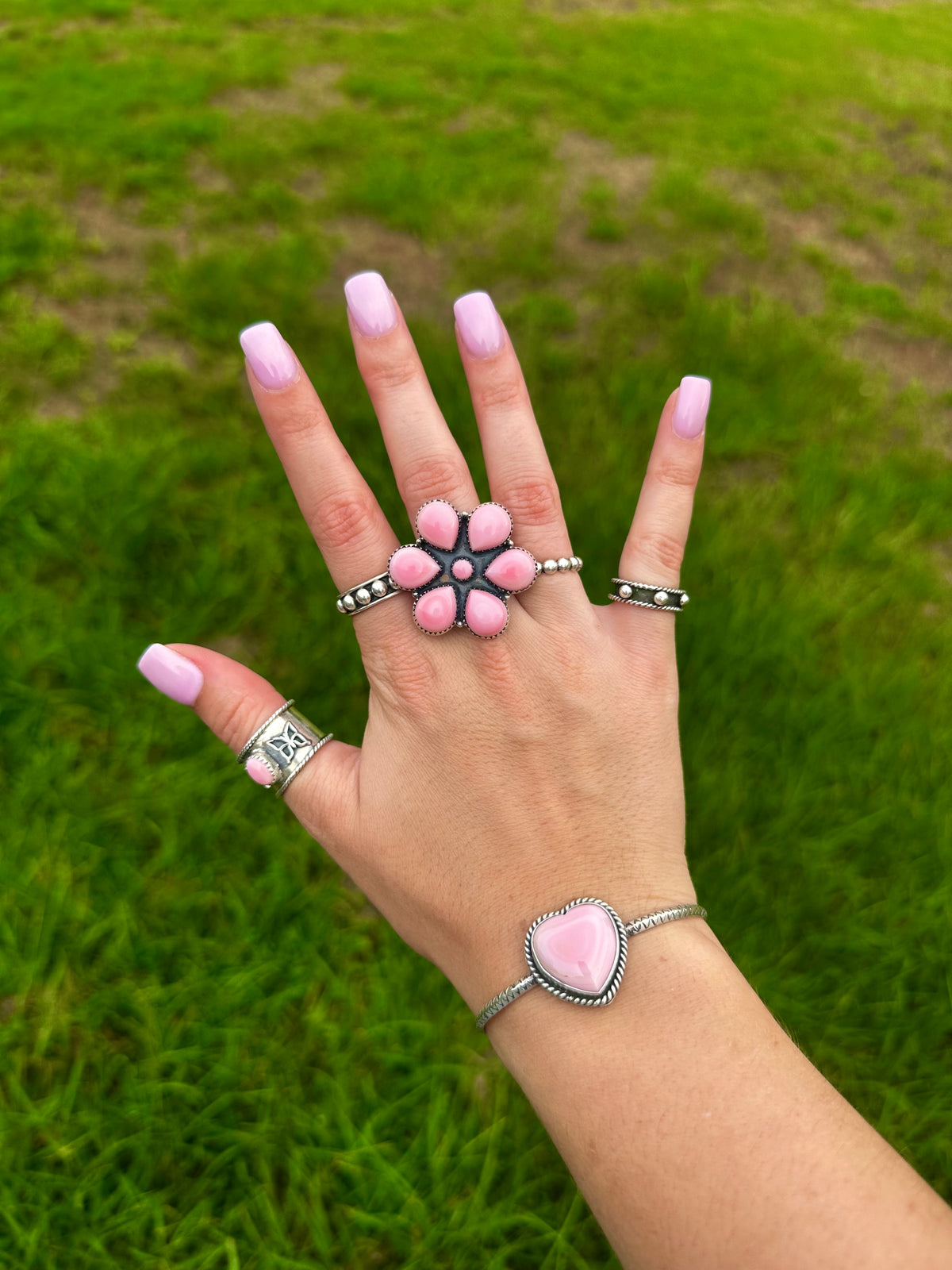 Pink conch heart Cuff by Navajo artist Donavan Skeets