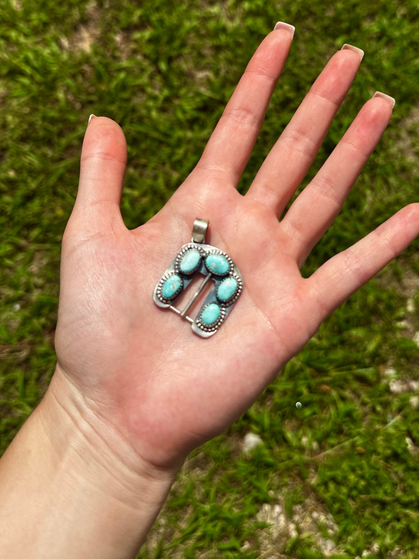 White water buckle pendant