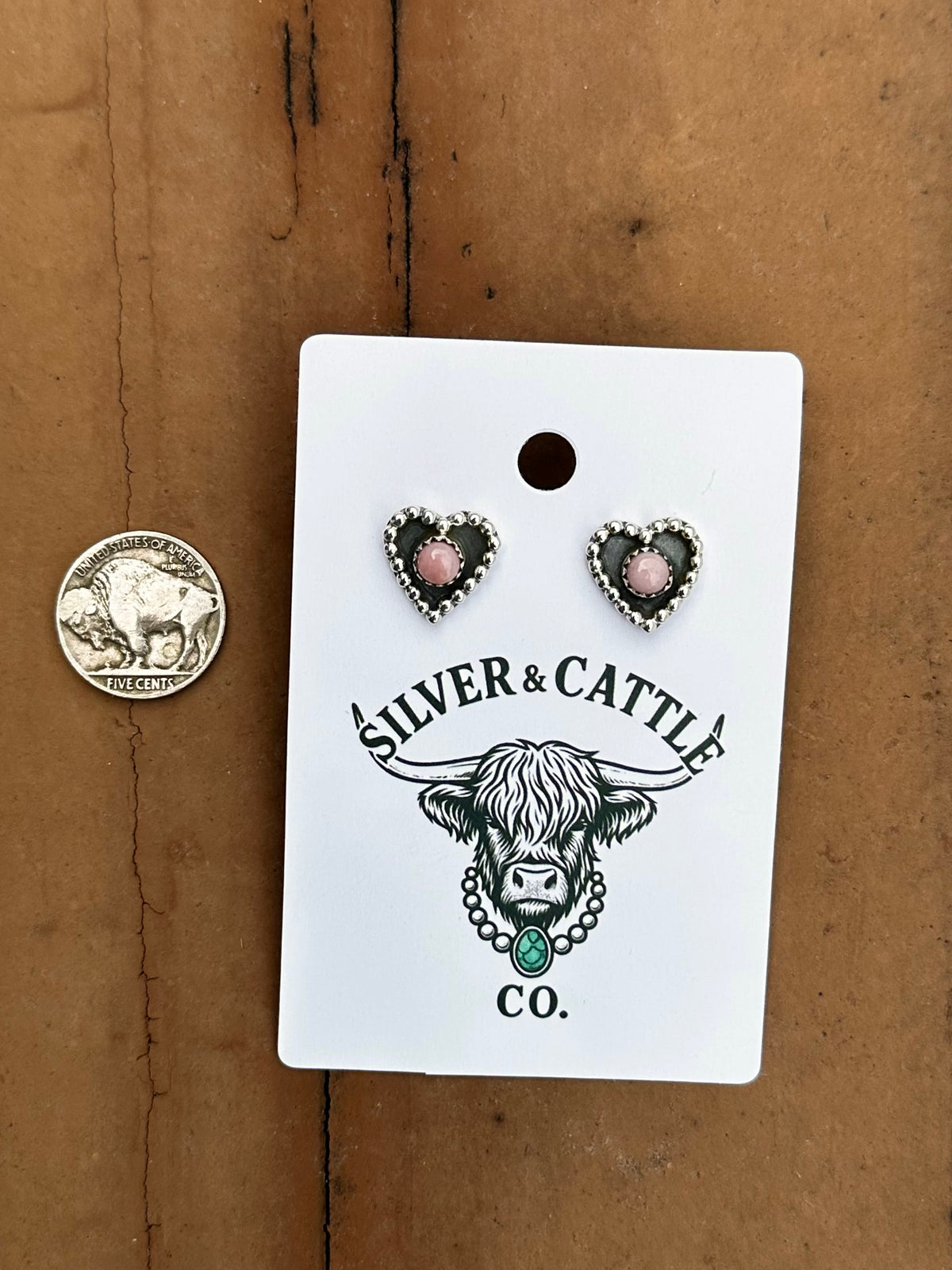 Pink conch heart earrings