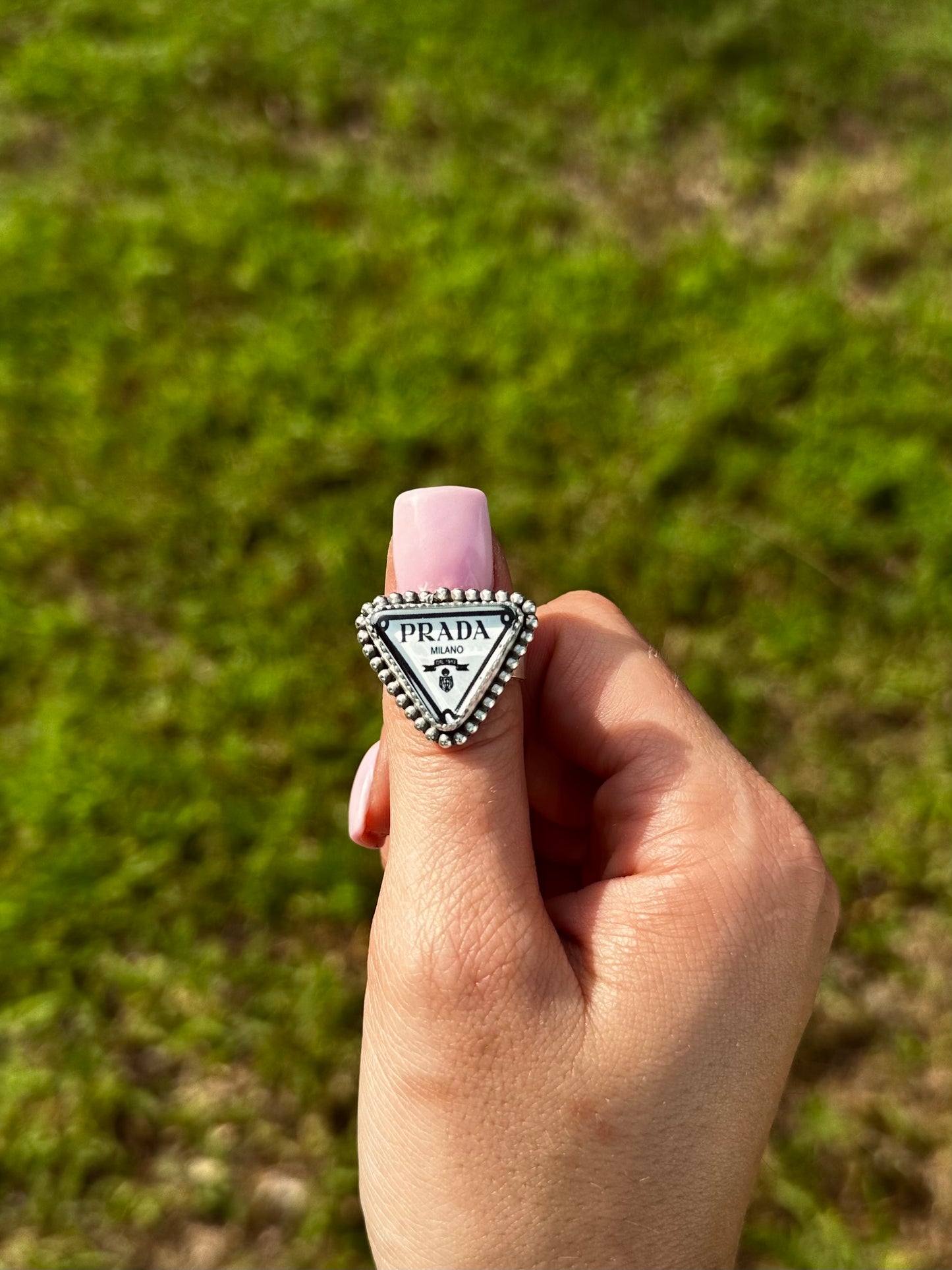 Adjustable designer ring