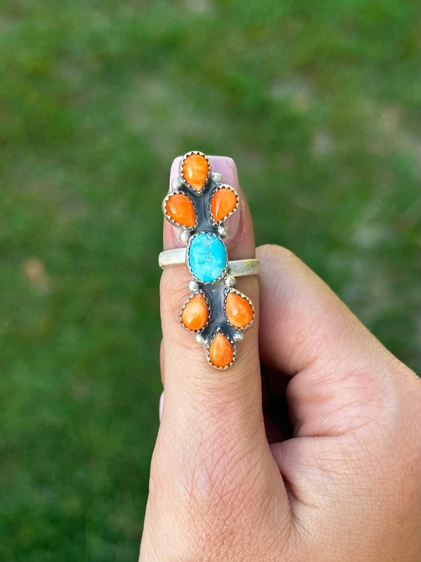 Adjustable orange spiny, and Golden Hills ring