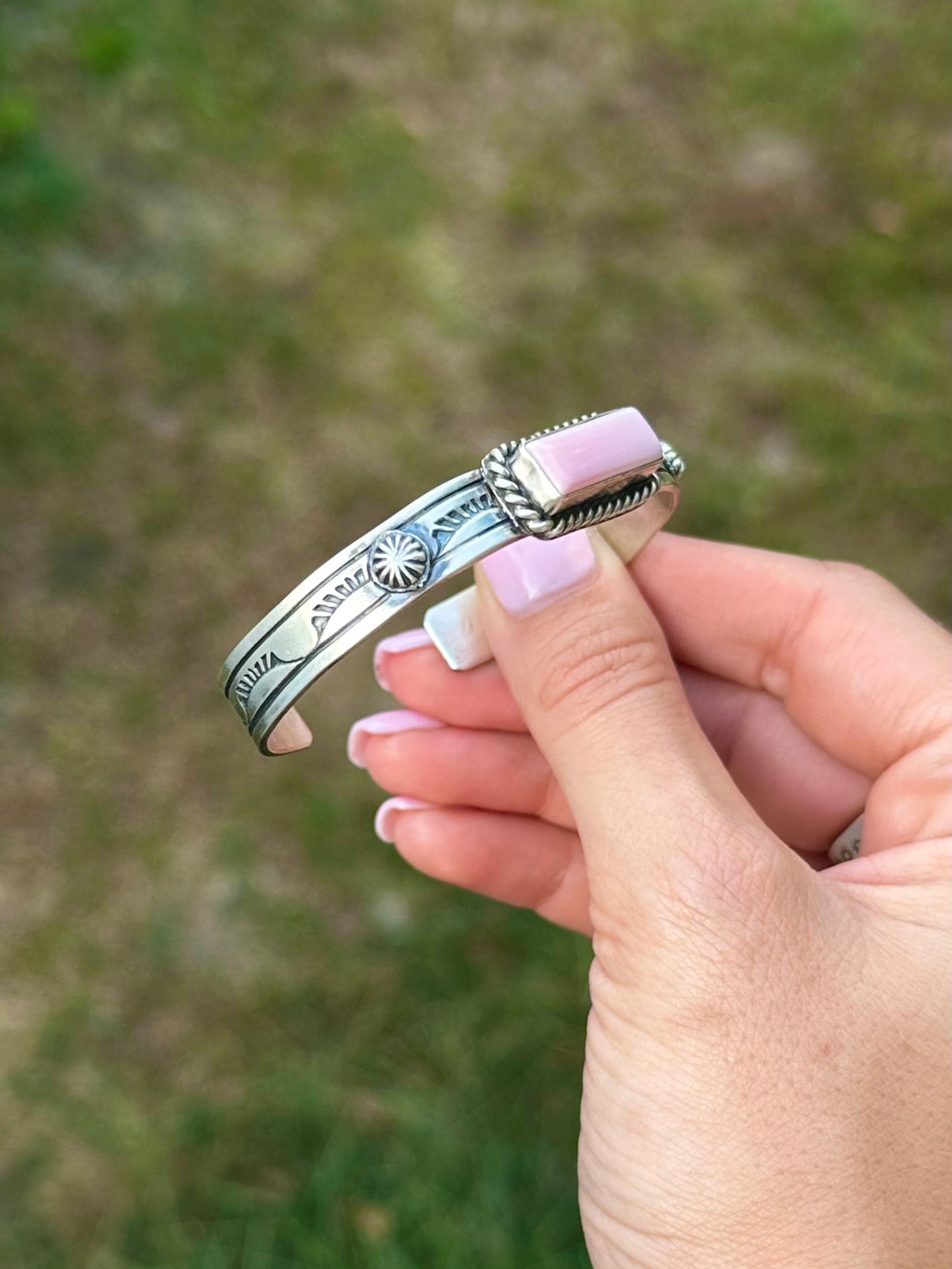 Pink conch cuff by Navajo artist Rick Enriquez