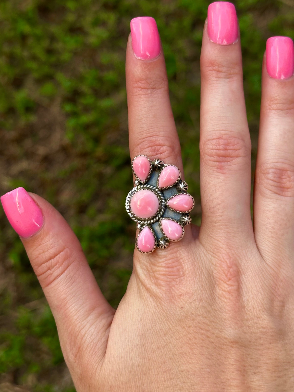 Adjustable pink conch half cluster ring