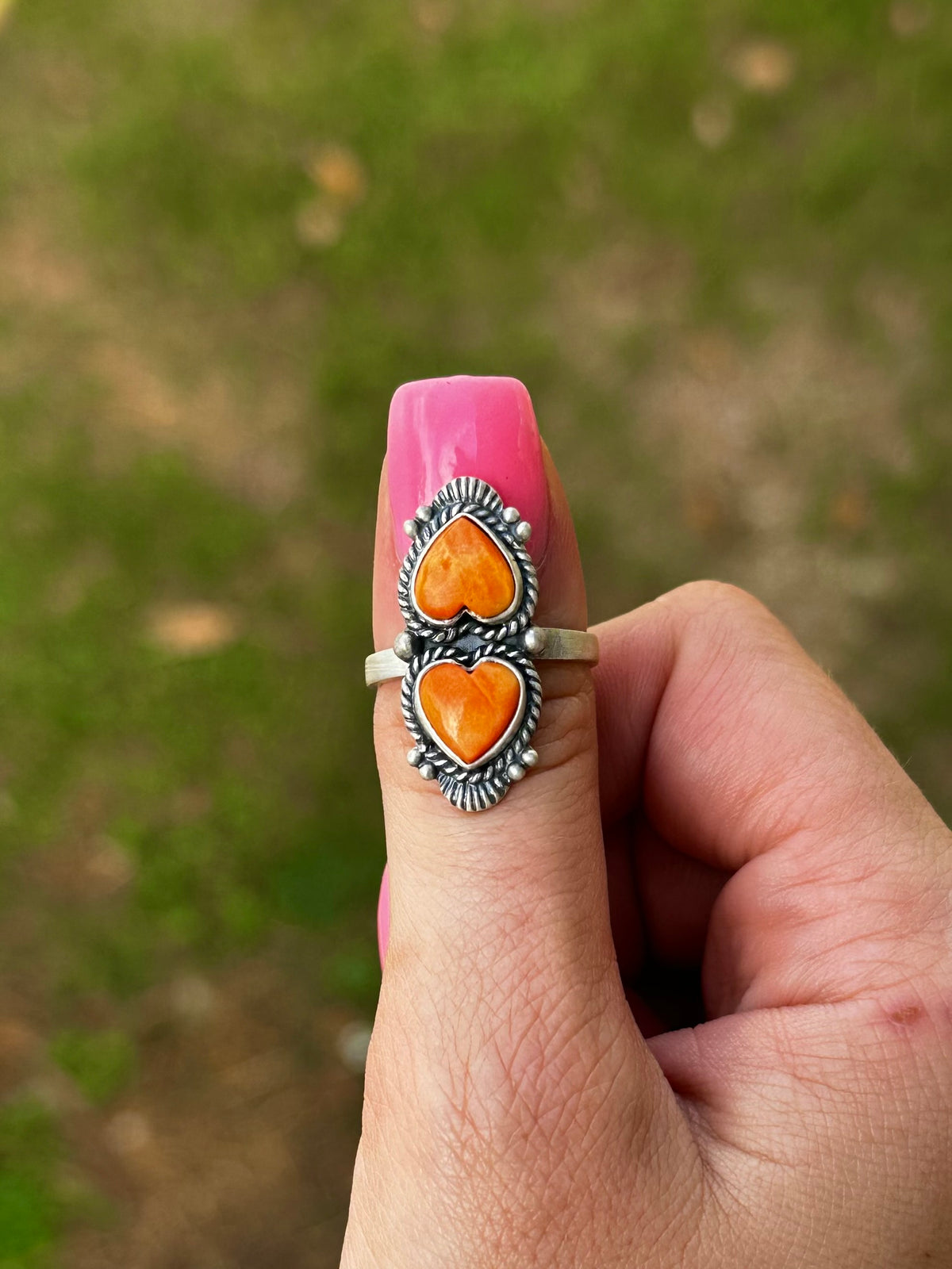 Adjustable orange spiny heart ring