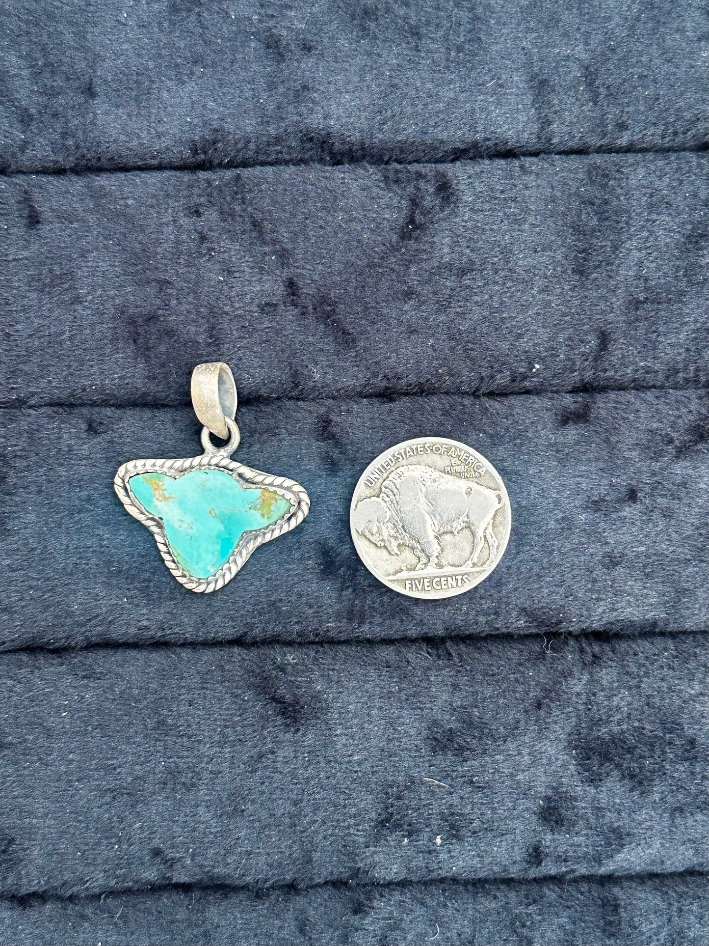Kingman Calf pendant