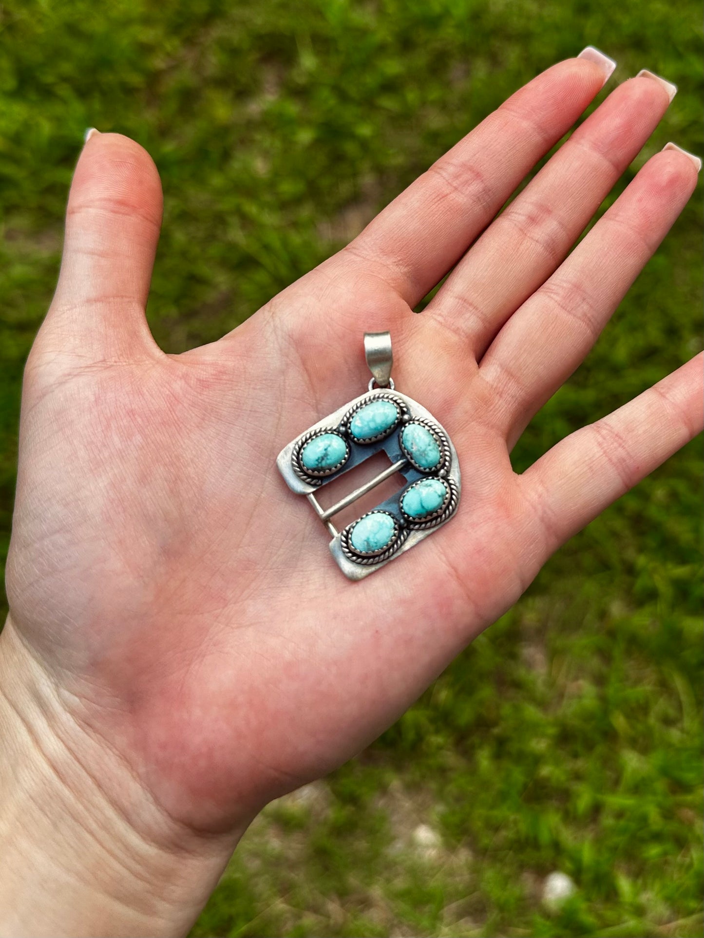 White water buckle pendant