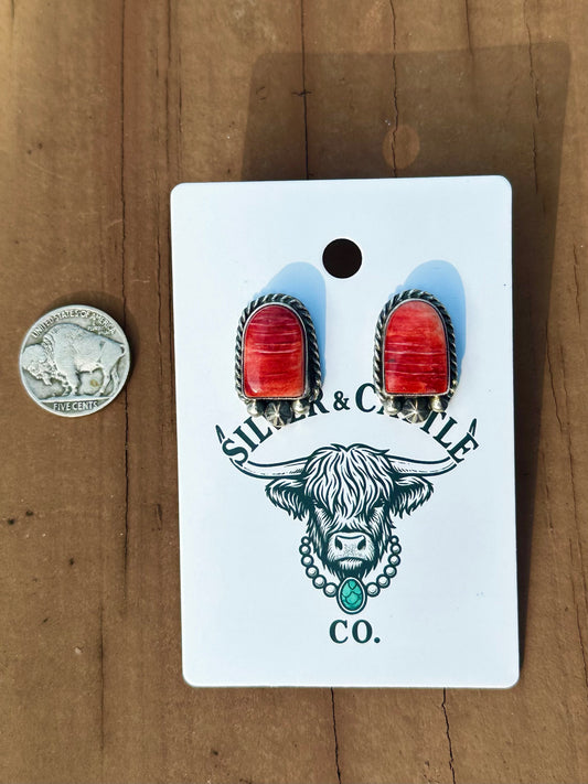 Red spiny oyster earrings made by Navajo artist Chassity Belone ￼