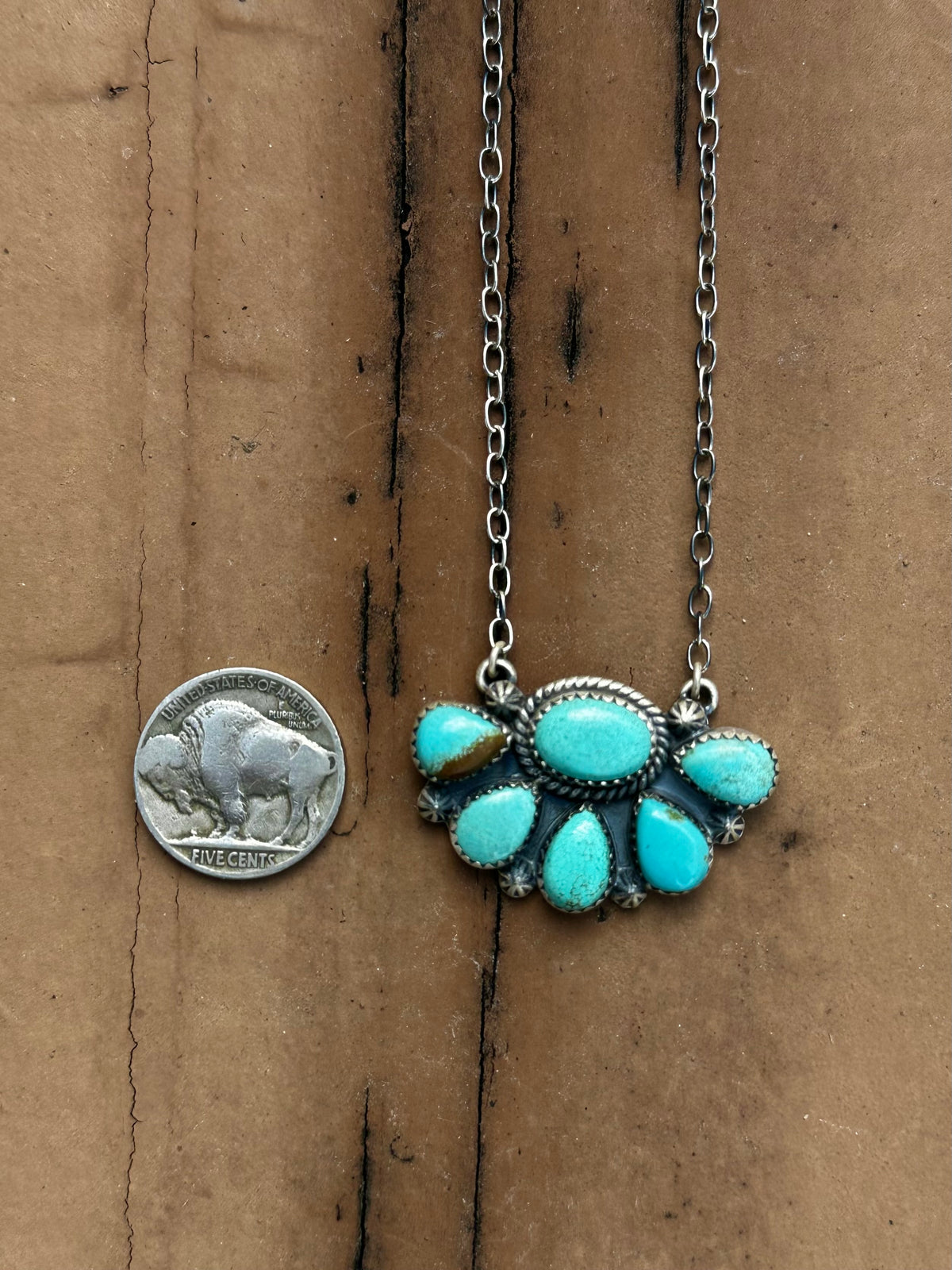 Half cluster necklace