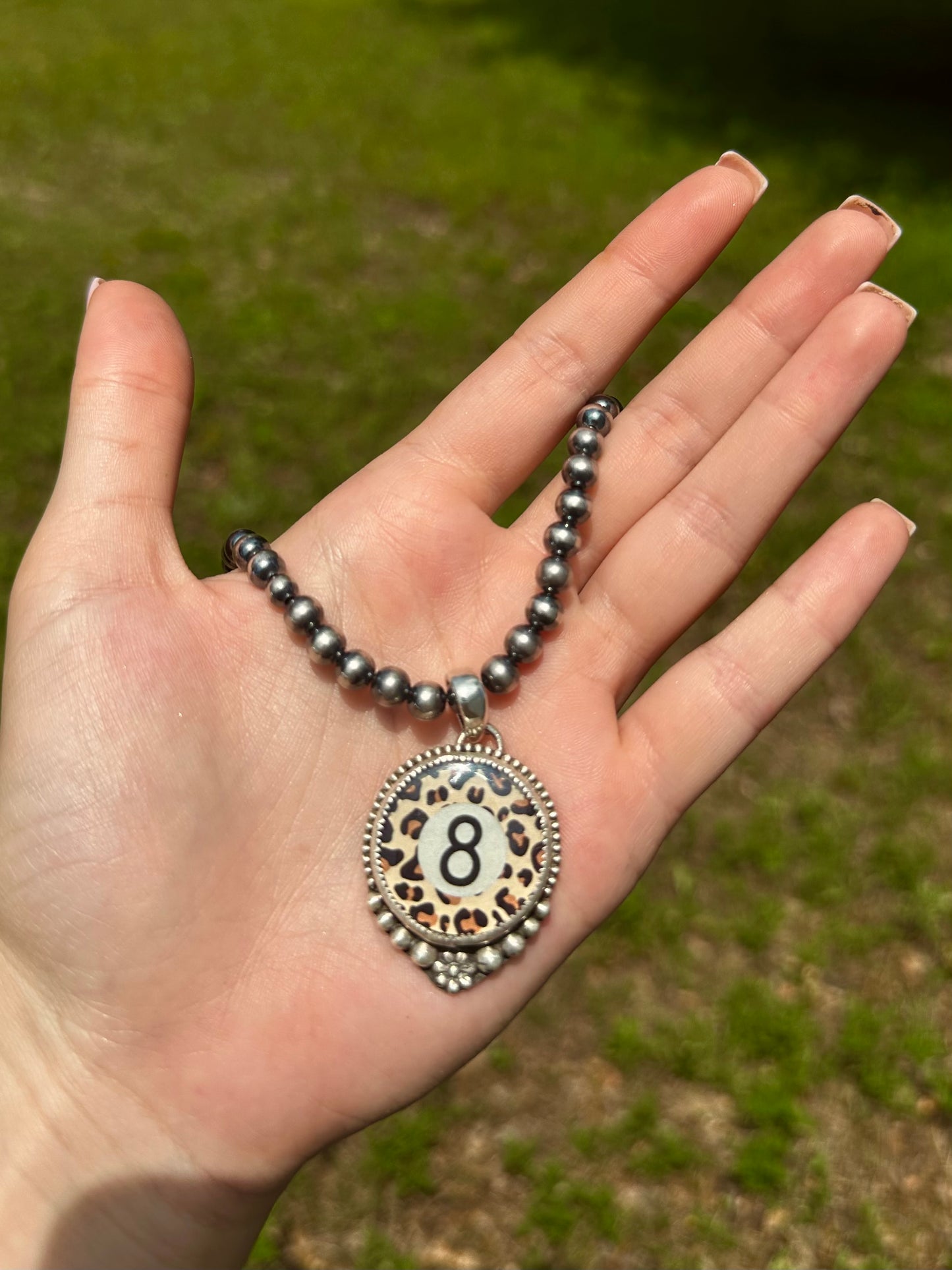 Cheetah 8 ball pendant