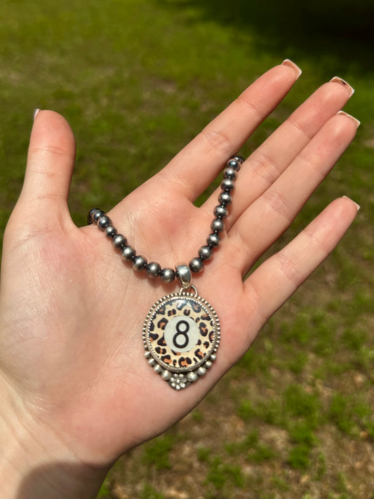 Cheetah 8 ball pendant