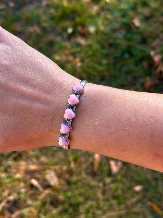 Pink conch heart cuff