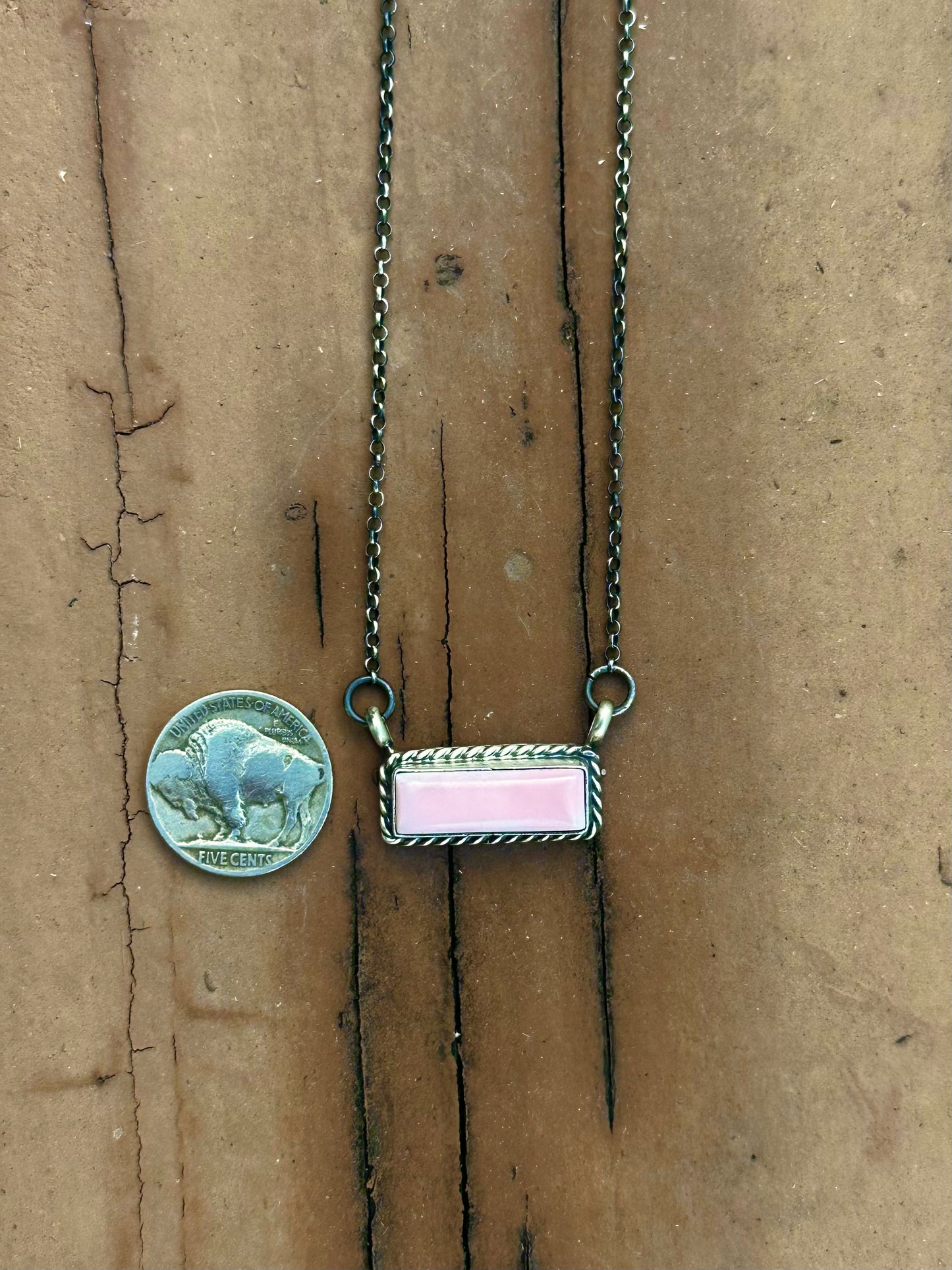 Pink conch necklace by Navajo artist Chassity Belone
