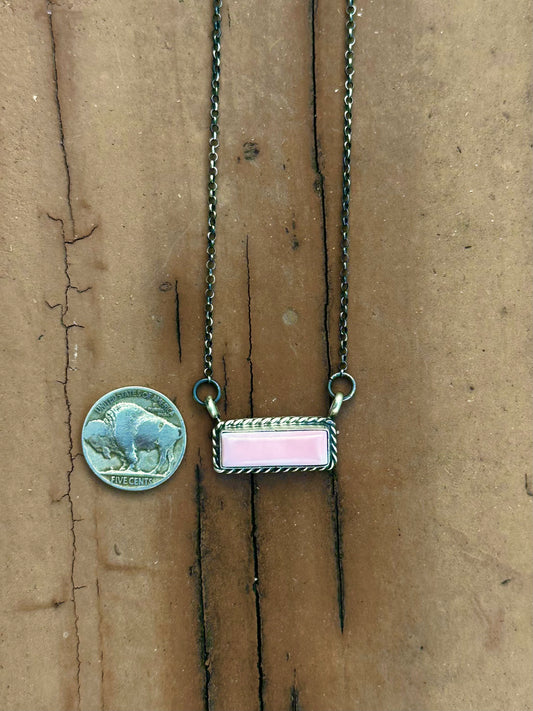 Pink conch necklace by Navajo artist Chassity Belone