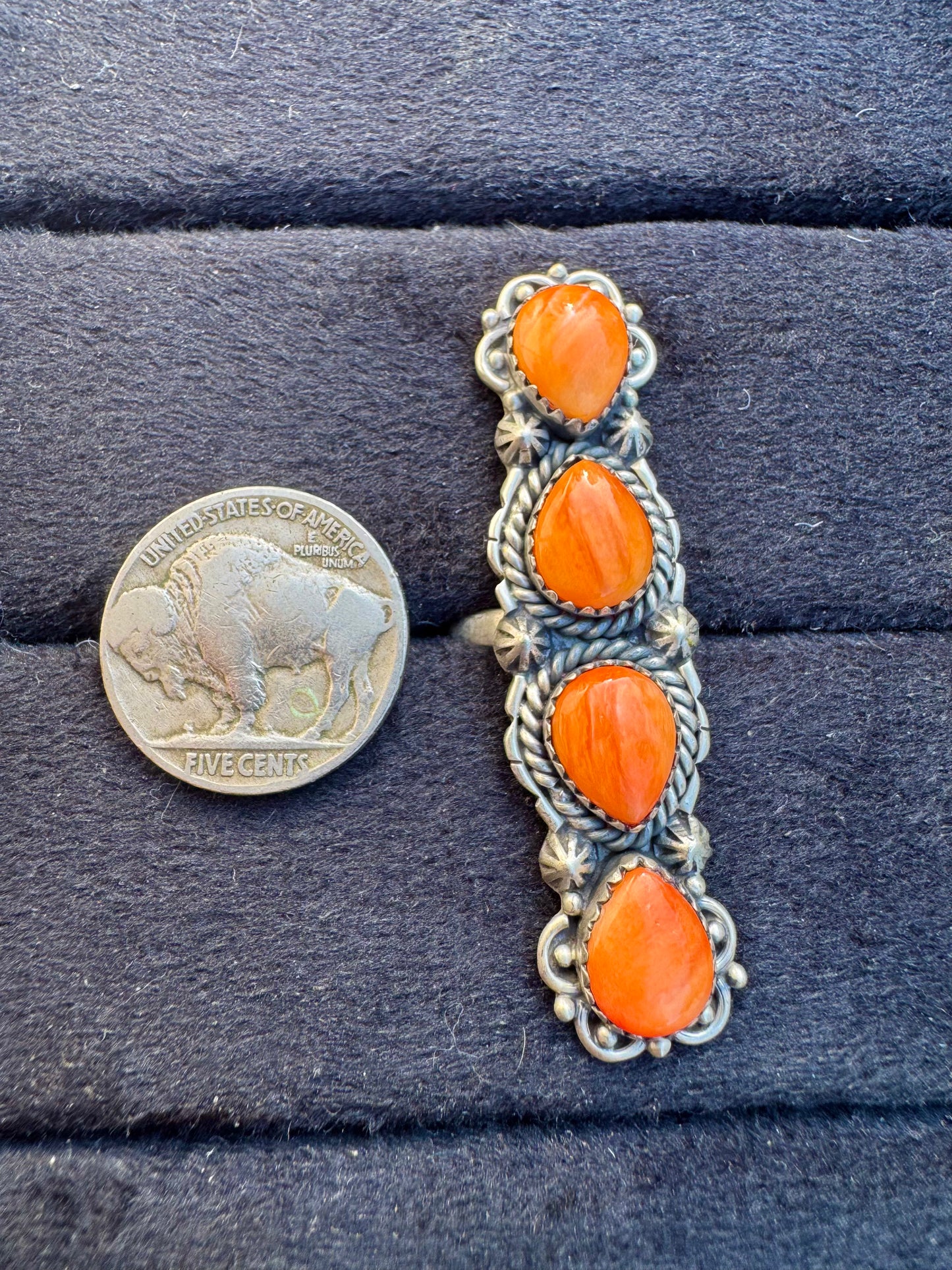 Adjustable orange spiny ring