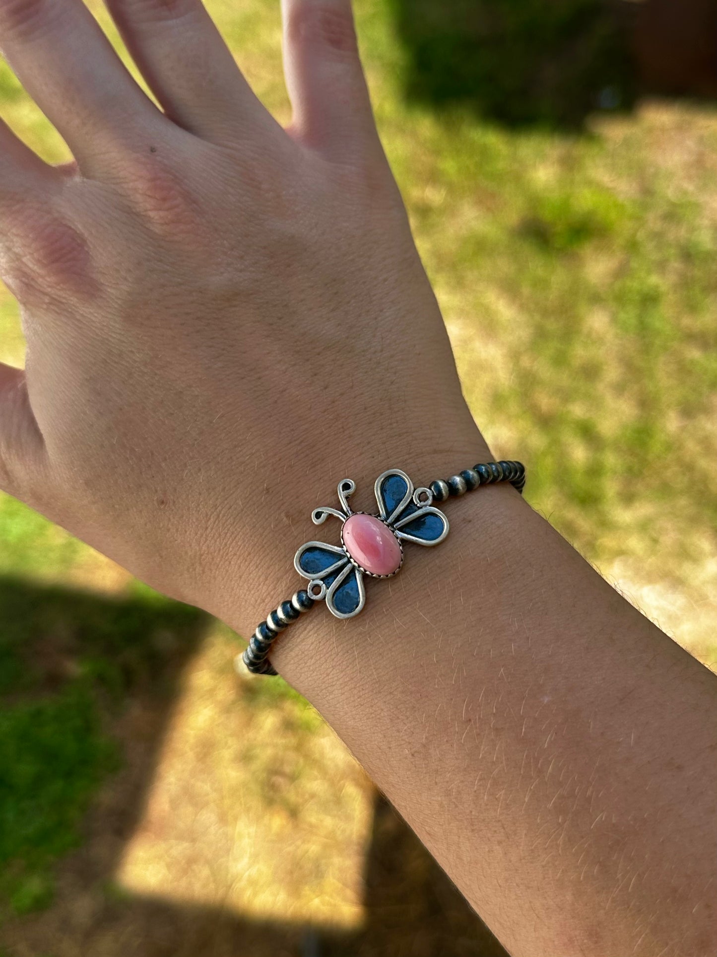Pink conch butterfly stretch bracelet