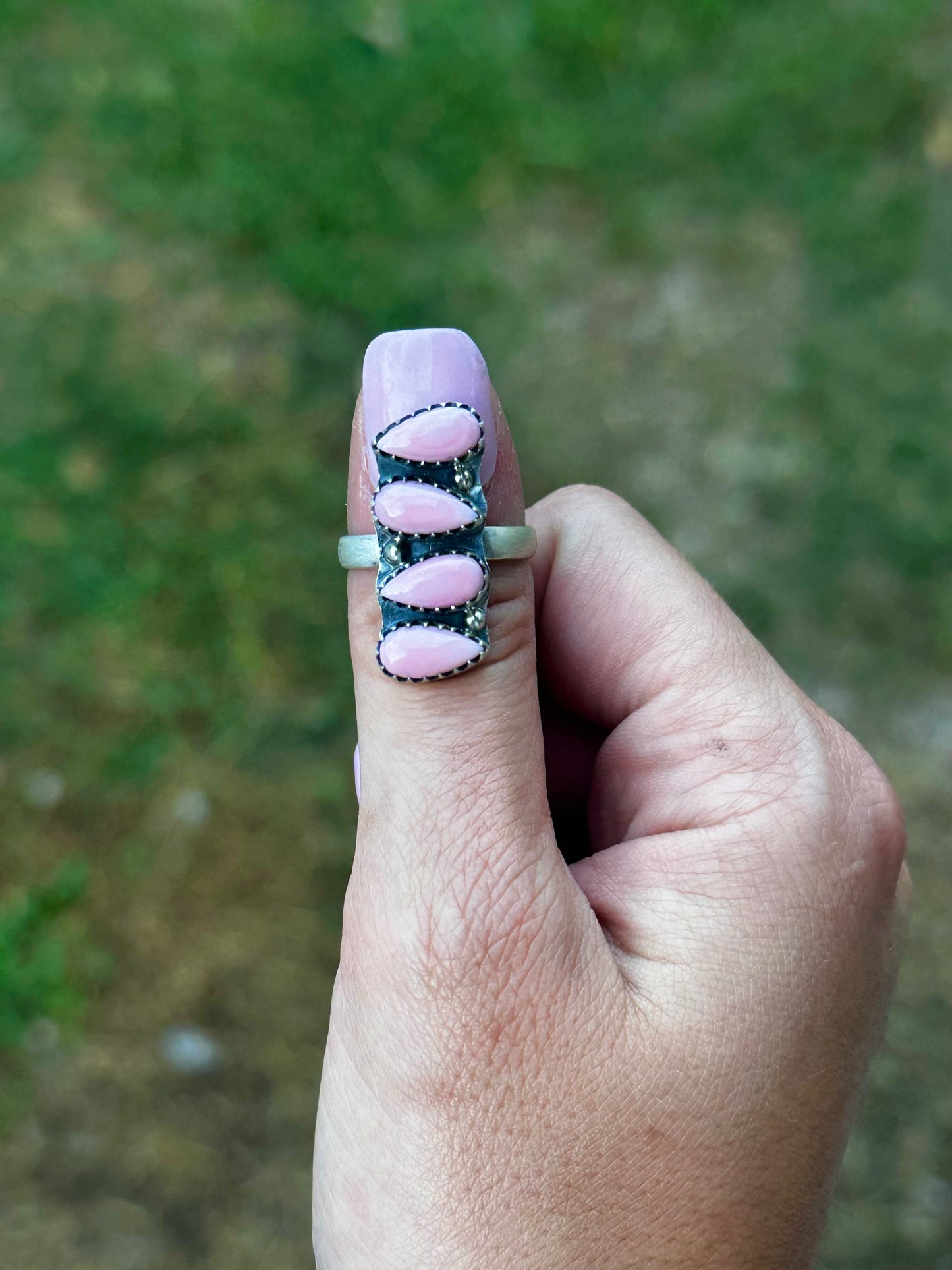 Adjustable pink conch ring