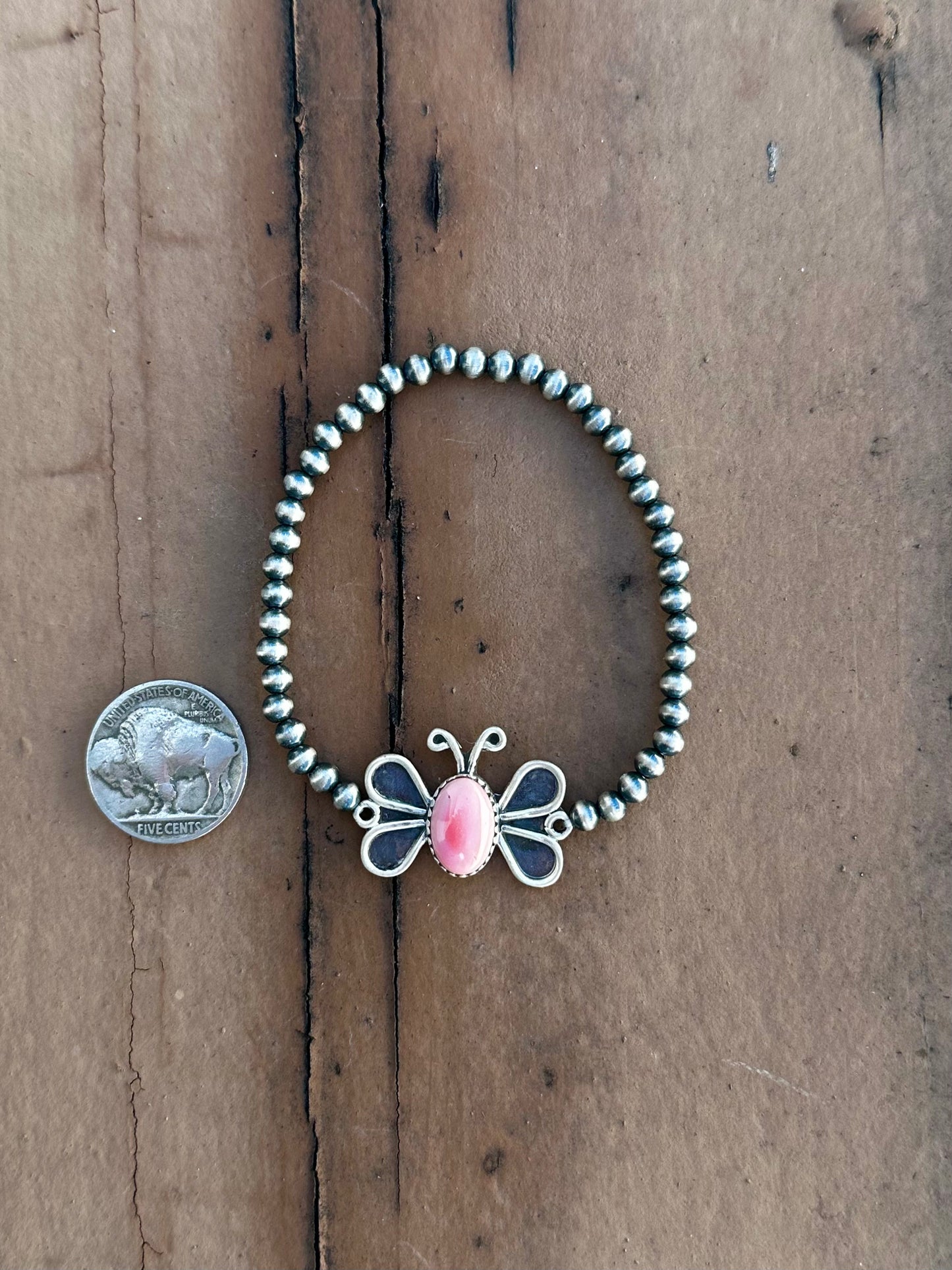 Pink conch butterfly stretch bracelet