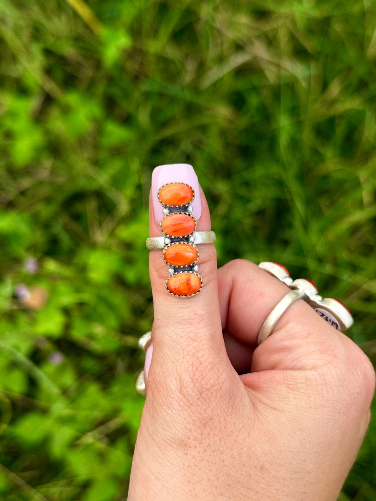 Adjustable Orange spiny 4 stone ring